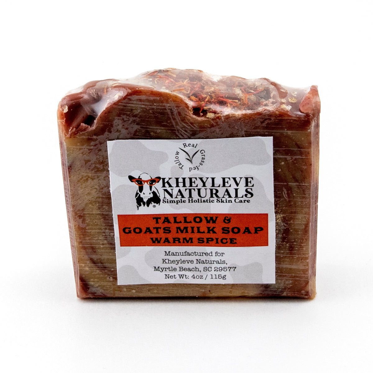 Grass fed tallow soap bar in warm spice scent with natural ingredients on white background
